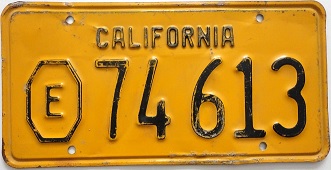 1956+ exempt plate with E in octagon, 74 613